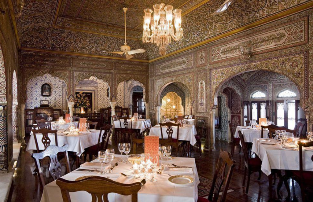 A glance at the luxurious dining room of the Samode Haveli, Jaipur.